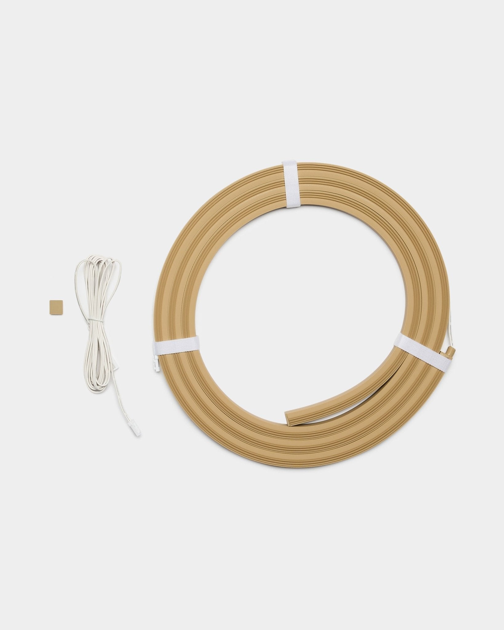 Bande LED WoodUpp Lumi en beige, longueur 240 cm, conçue pour s’intégrer aux panneaux acoustiques Akupanel ou à d’autres projets LED WoodUpp.