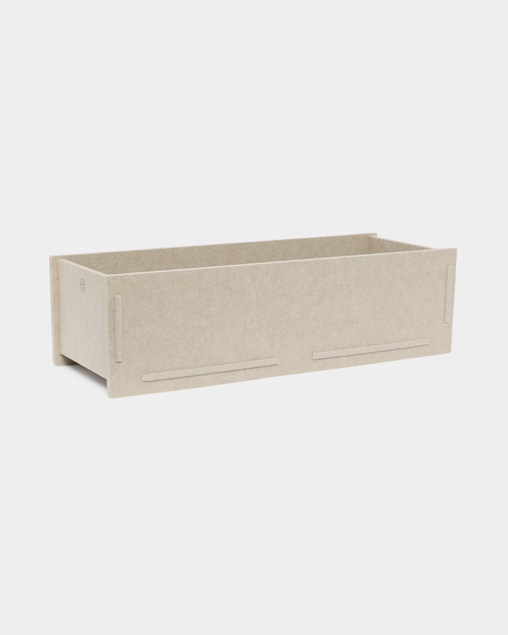 WoodUpp Vigg Felt Box BM2 en beige, un accessoire de rangement livré à plat en feutre PET résistant, conçu pour compléter les panneaux acoustiques en bois Akupanel.